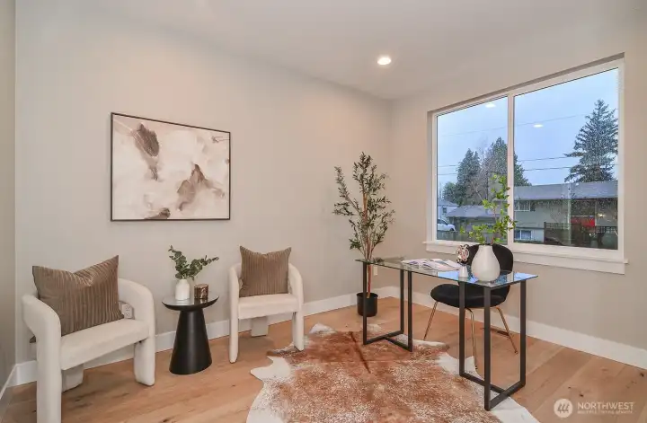 Den/office or 5th bedroom on the main level.