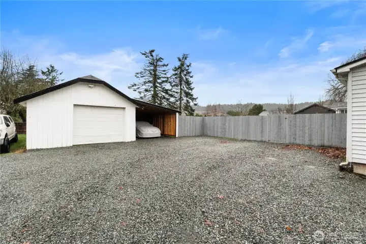 Detached garage with attached carport!
