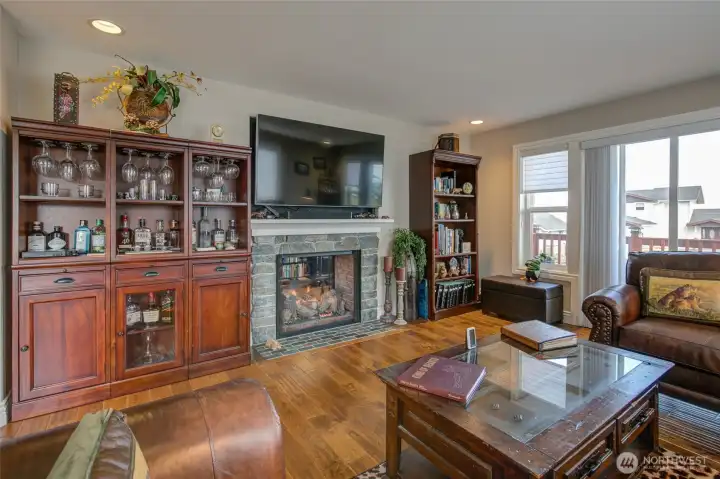 Living room faces the other side of the two-way fireplace.