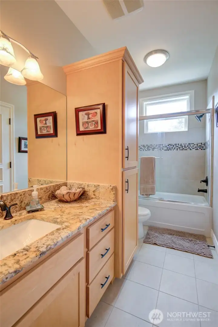 Upstairs guest bathroom is the last of the rooms on the upper level.