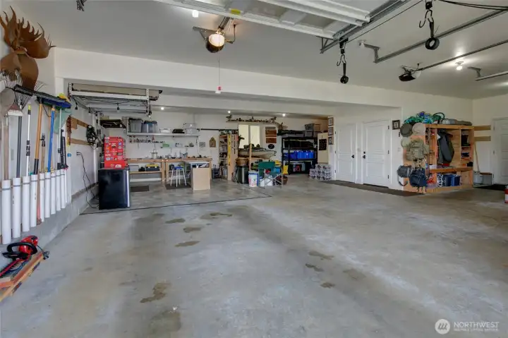 A quick peek inside this huge garage! There is so much storage in here!!!! And it's deep enough to fit 3+ vehicles, depending on their size!