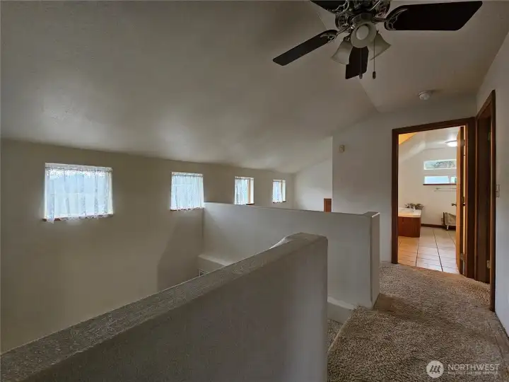 Love all the Windows looking out over your land!  Perfect little reading nook in the corner!