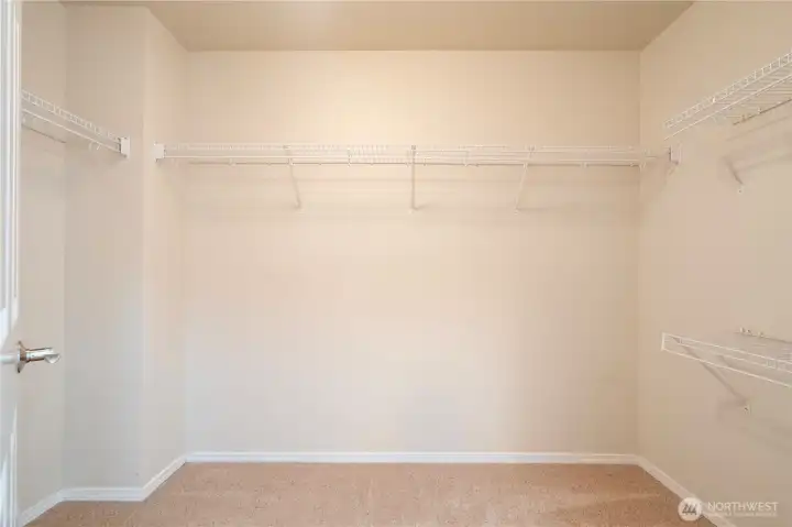 His and Her closet in mater bathroom