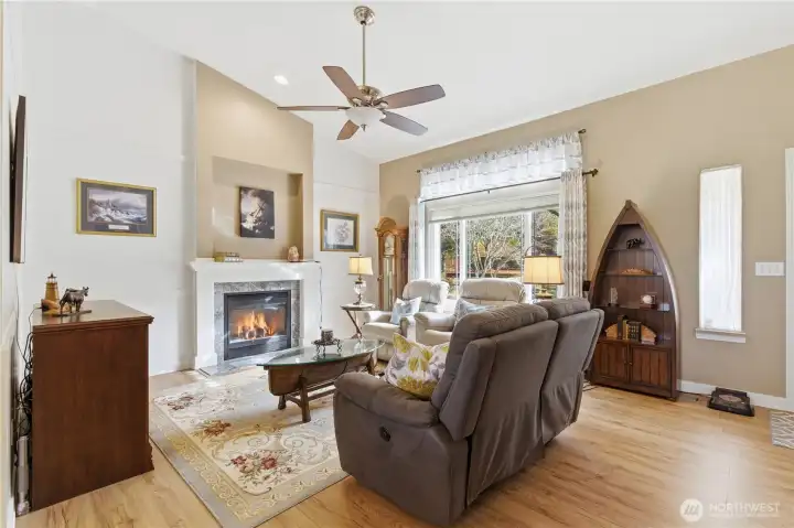 Bright living room to welcome you home. Updated flooring throughout.