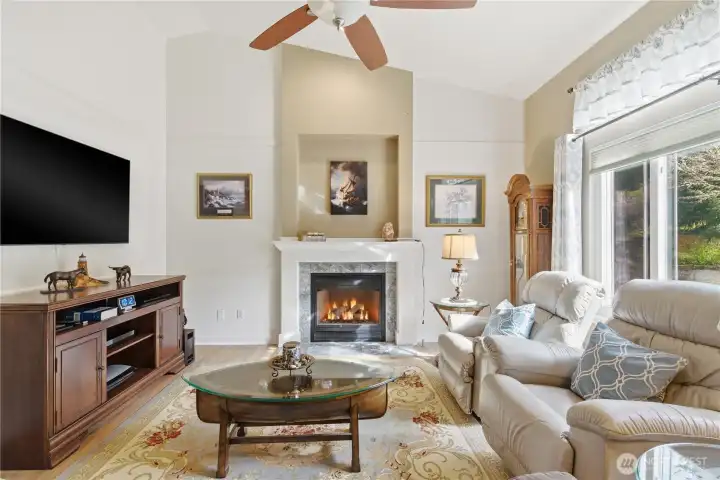 High ceilings and a ceiling fan create an airy, comfortable space