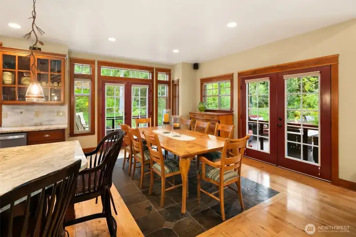 Double sets of French doors lead out to your "happy" place, outdoor deck provides ample room for all your guests to kick back and relax while listening to the creek and waterfall in your back yard oasis.