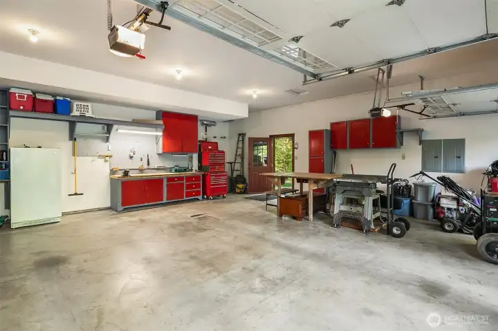 Over-sized attached garage with tons of storage and ample work space, generator hook up and 200 power!!!