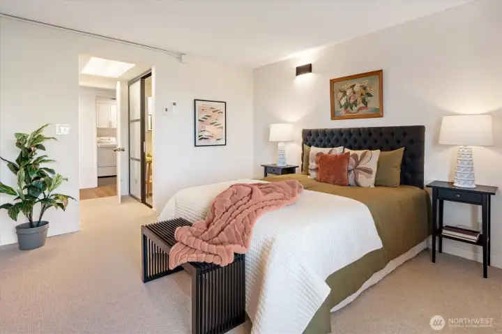 Large primary bedroom w/a double closet and access to 3/4 bath, also has plenty of room for dressers and a chair to enjoy the view