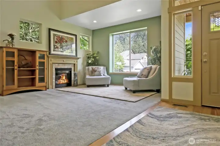 The fireside living area enjoys light & scenery from multiple windows.