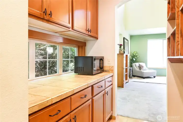 This handy butler's pantry connects to the formal dining area for effortless serving.