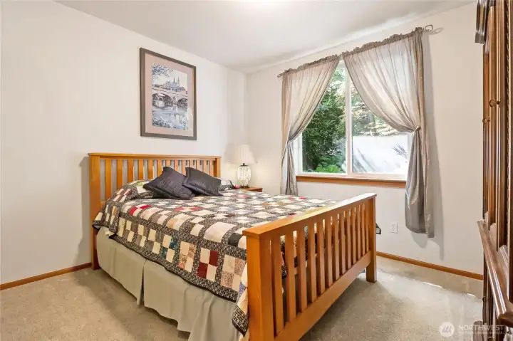 Main-floor bedroom just off the family room...would also be great for an office or guests!