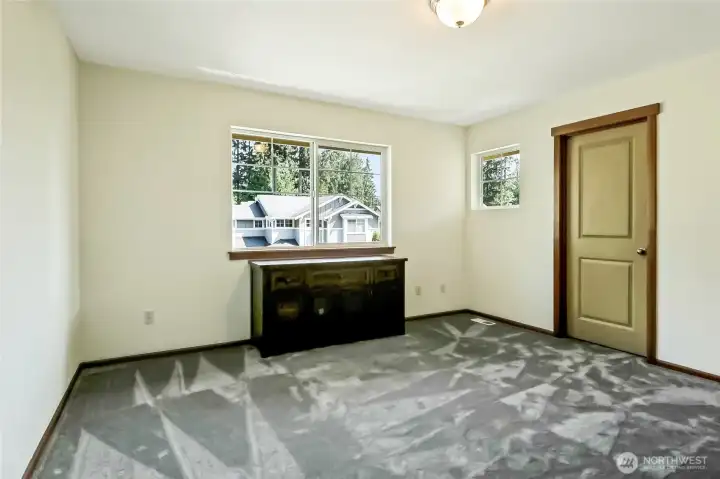 Spacious second bedroom, also upstairs.
