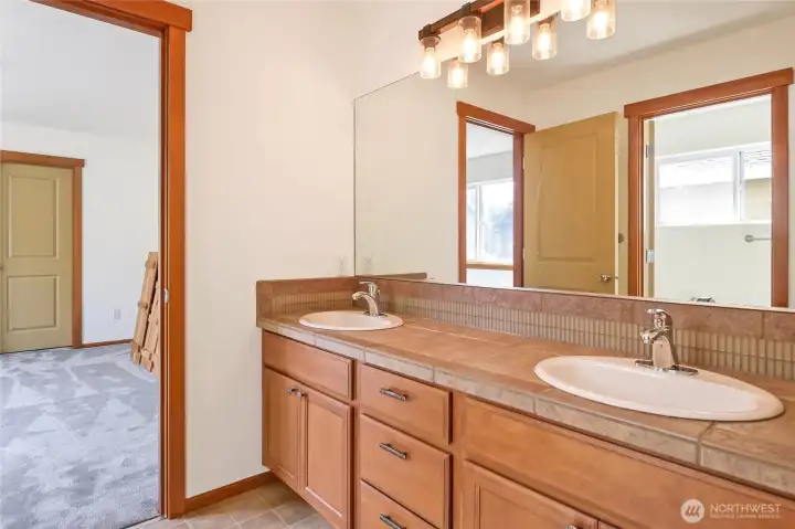 Full "Jack & Jill" bathroom with private access from both the 2nd & 3rd upstairs bedrooms.