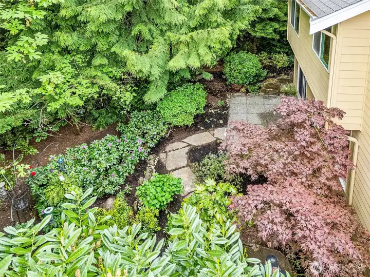 Grill on the patio, or meander along the stone pathway.