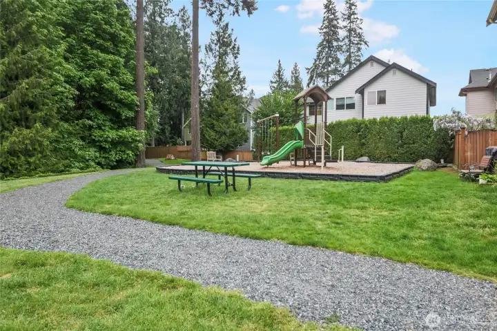 Stroll to the neighborhood playground, just two houses away across the street.