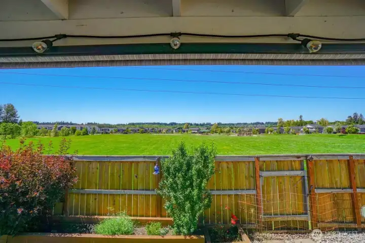 View of huge community park from rear deck with your own gate for convenient access to park View of huge community park from rear deck with your own gate for convenient access to park