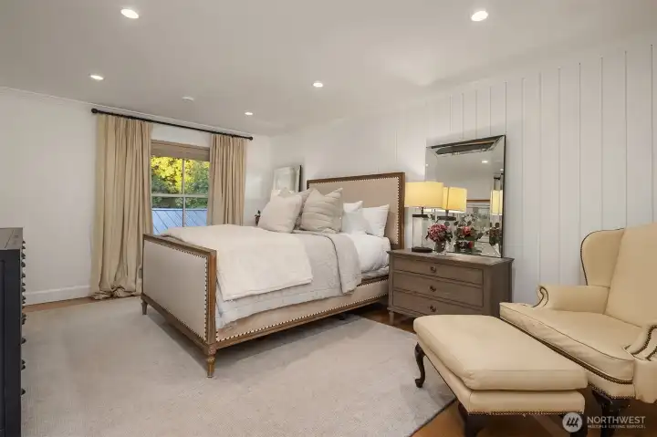 Your primary suite features lovely custom millwork. Your primary suite features lovely custom millwork.