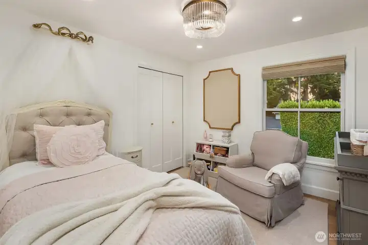 Second upstairs bedroom with designer light fixture & custom Roman shade. Second upstairs bedroom with designer light fixture & custom Roman shade.