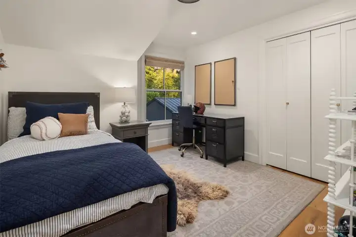 Third upstairs bedroom, also with a custom Roman shade. Third upstairs bedroom, also with a custom Roman shade.