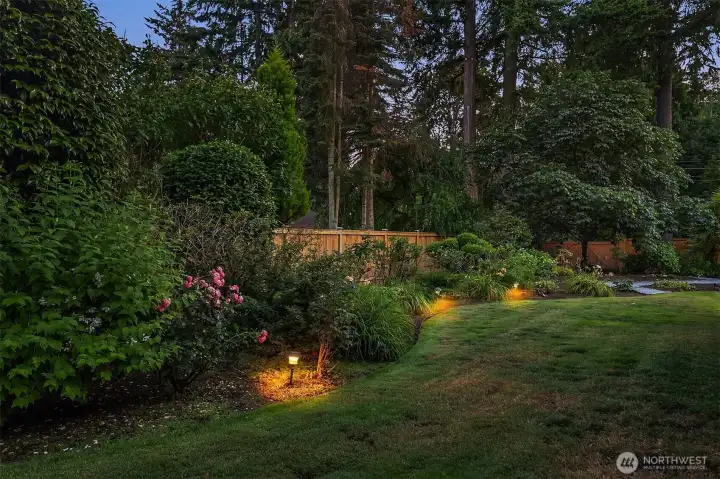 Mature landscaping has been curated for year-round color & blooms. Mature landscaping has been curated for year-round color & blooms.
