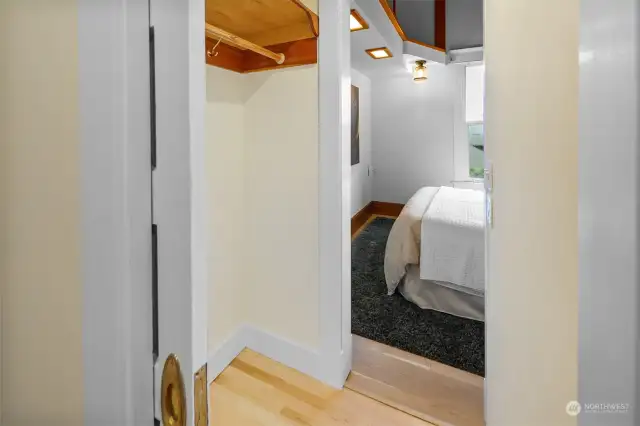 Bedroom has vestibule entrance with closet and additional closet space within the room.