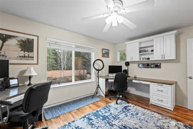 Office with built-in and murphy bed