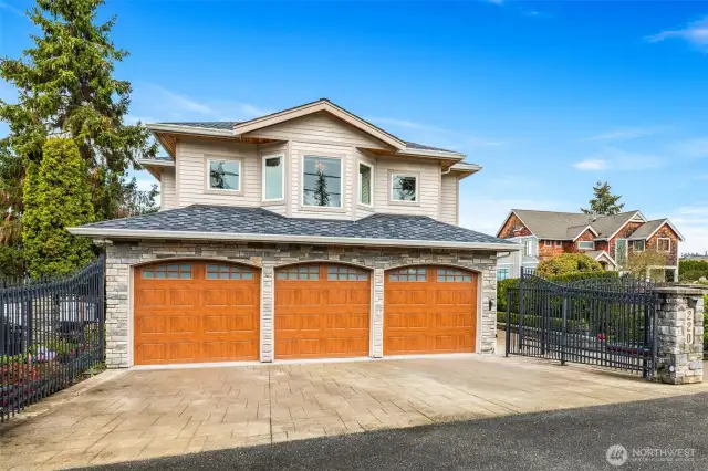 Gated entry with tandem 4 car garage.
