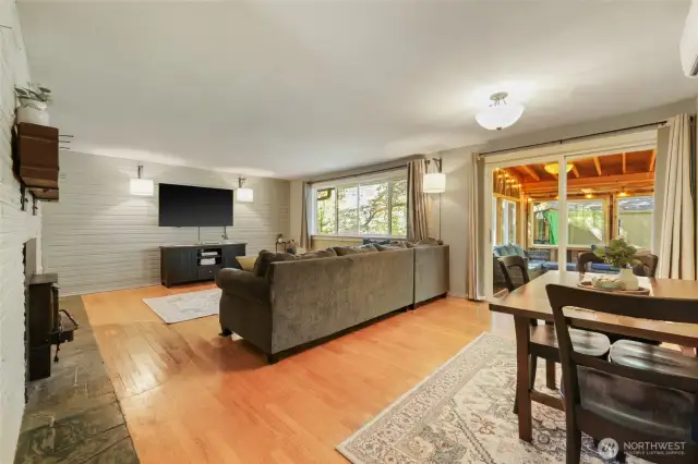 Sliding doors lead to newly constructed covered porch