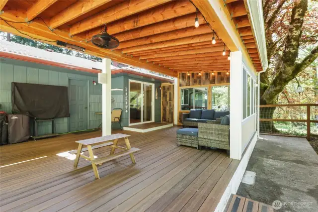 Freshly added expansive covered & partially enclosed porch w/ trex decking