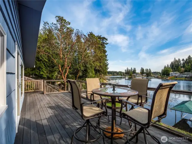 Walk out onto the deck from the living room on the main level
