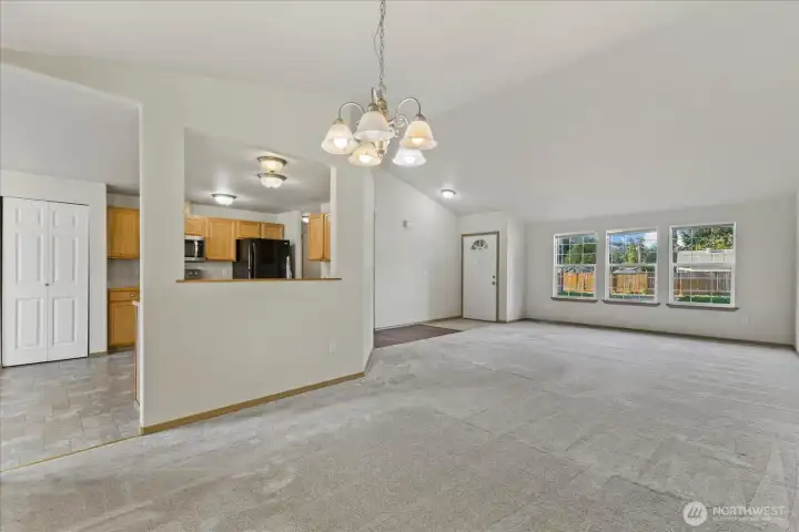 Dining, living room, and entry