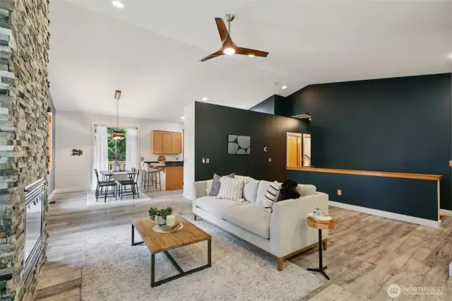 A flexible open layout maintains a smooth flow, with just enough separation from the kitchen for added comfort.