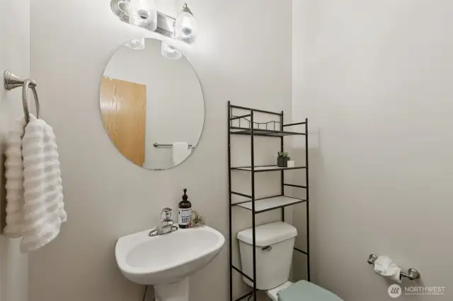 Half guest bathroom on the main level, with new light fixtures.