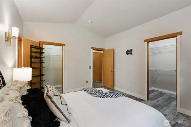 Primary bedroom with not one, but two walk-in closets!