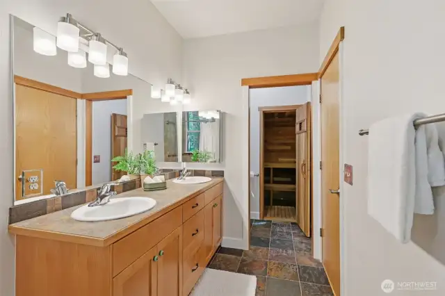 Another view of the ensuite bathroom—featuring a sauna at the back and a separate toilet for added privacy.