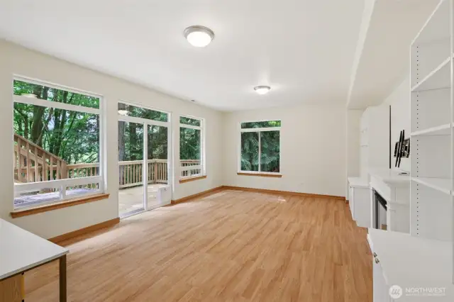 Lower-level rec room with access to one of two decks—ideal for creating a separate living area.