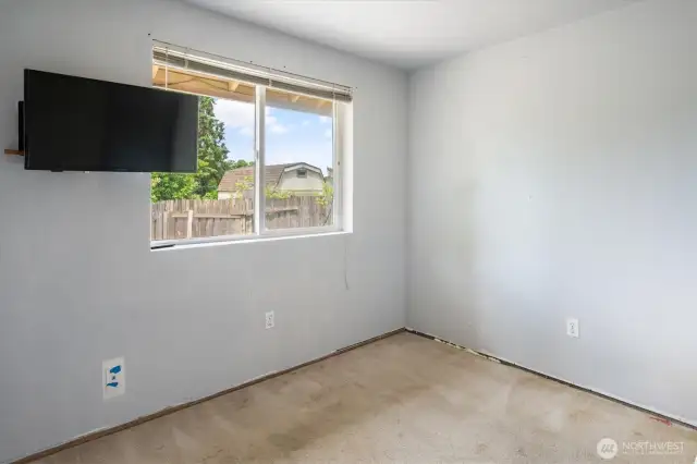 -The second of three bedrooms is spacious and ready to welcome all who seek rest and relaxation!