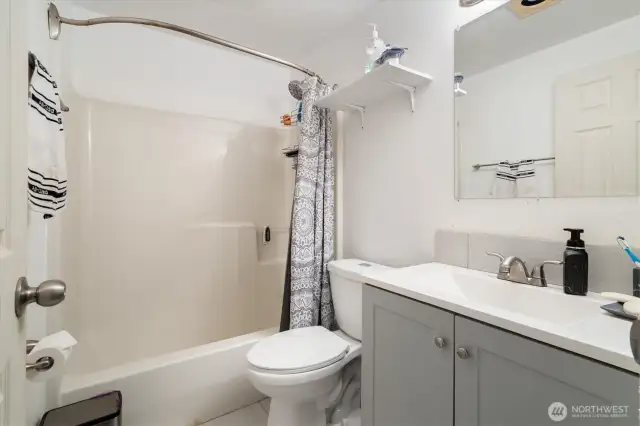 -A large, recently updated full bathroom gives residents and guests alike a sizable helping of convenience.