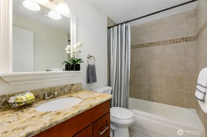 main bath with granite counter tops