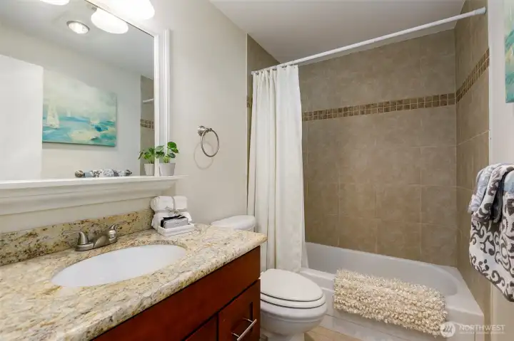 Primary bedroom bath ensuite full bath granite & newer cabinetry