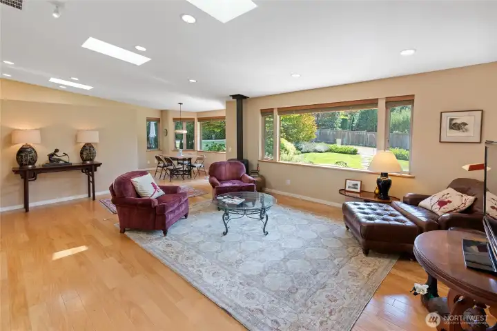 Light filled living room, hardwood floors.