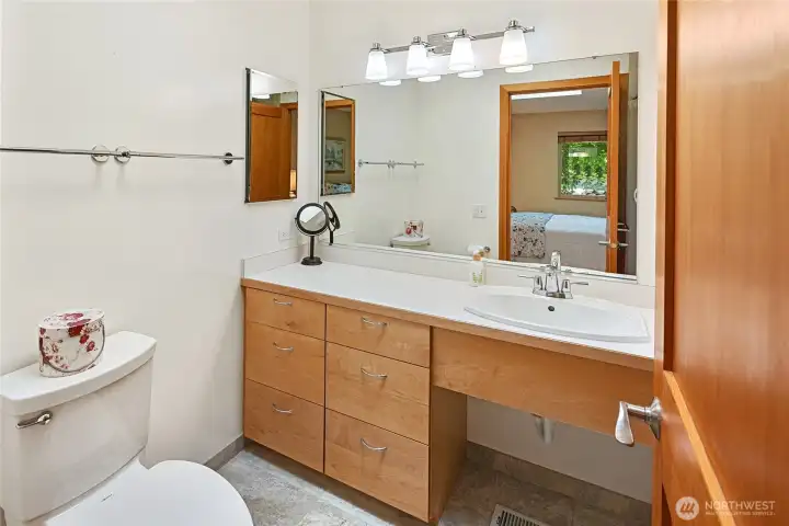 Master 3/4 bath with good lighting, easy access to Primary BR.