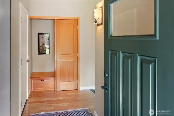 Front door opens to nice entry with closet/seat, nice custom touch.