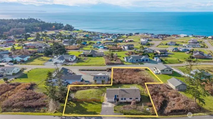 The double lot in front of the home protects the view and is included in the sale. The two lots are both buildable, so they're an excellent investment.
