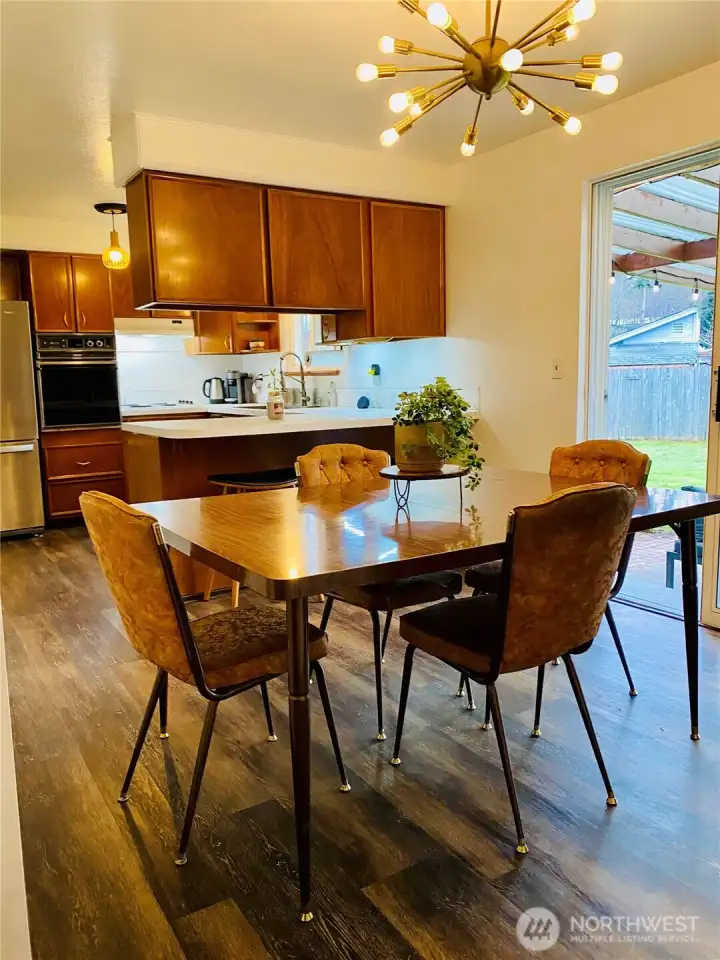 Enjoy your dining room with a view of the covered patio and updated lighting!