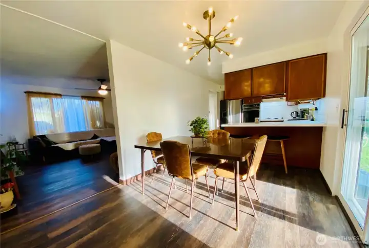 So much great natural light shining into the dining room and kitchen at sunset.