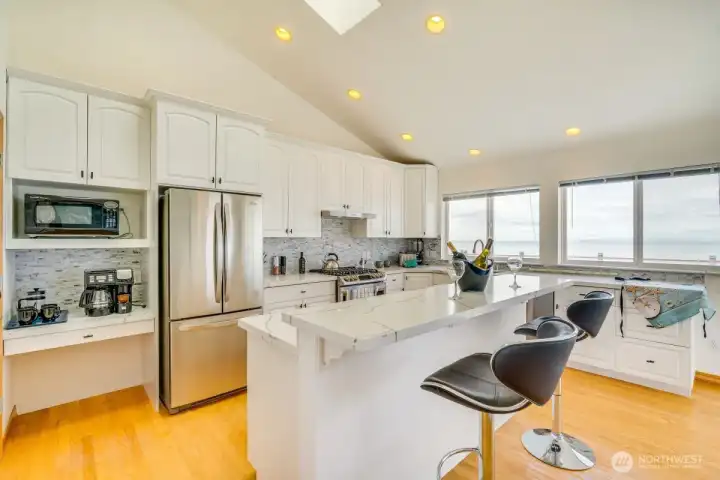 A Chef's Kitchen with stunning Western views ~ Cook dinner while the sun sets into the Sound