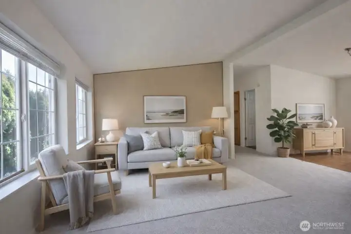 Windows bring in the natural light, vaulted ceiling and new carpet throughout the living room and home.  Virtually staged