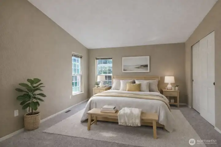 Primary bedroom, vaulted ceiling, fresh paint and new carpet.  This room does have two closets.