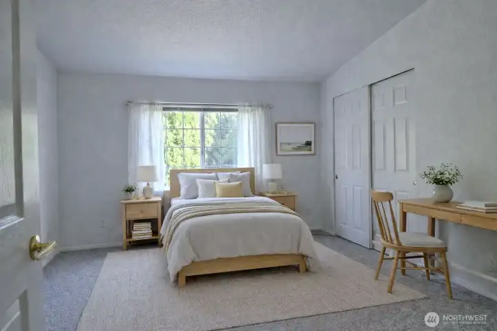 2nd bedroom, spacious and notice the new carpet.